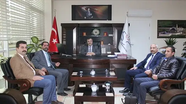 MHP'den Milli Eğitim Müdürüne hayırlı olsun ziyareti