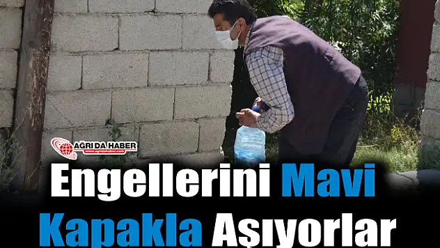 Engellerini Mavi Kapaklarla Aşıyorlar