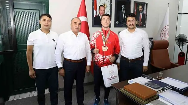 Balkan şampiyonu Ali Demir, İsmail Çalgan'ı ziyaret etti