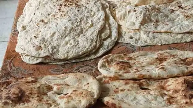 Ağrı'da depremzedeler için tandır ekmekleri pişirildi