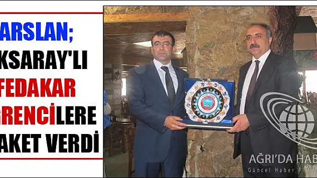 ARSLAN AKSARAY LI FEDAKAR ÖĞRENCİLERE PLAKET VERDİ
