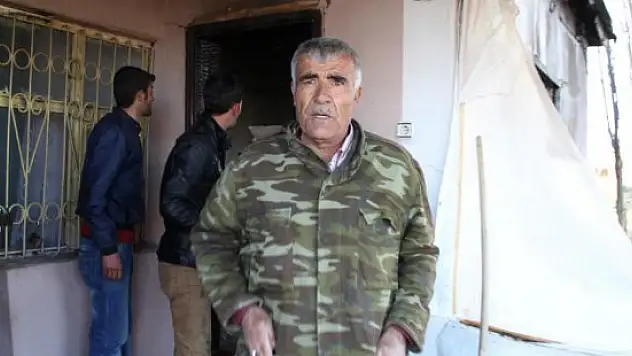 Çocuklarını yanan evden kurtardı