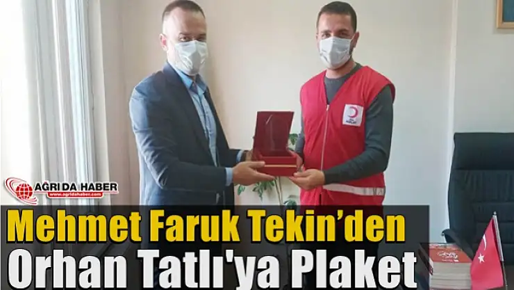 Mehmet Faruk Tekin'den Orhan Tatlı'ya Plaket